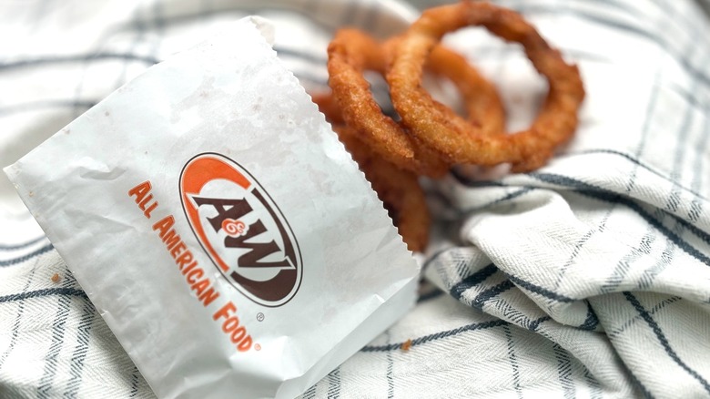 wax paper A&W package with onion rings on towels