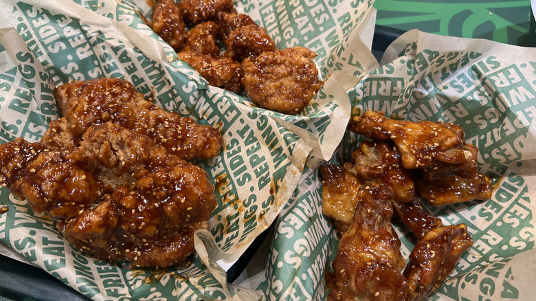 Baskets of Wingstop Sweet Chili Glaze flavored chicken