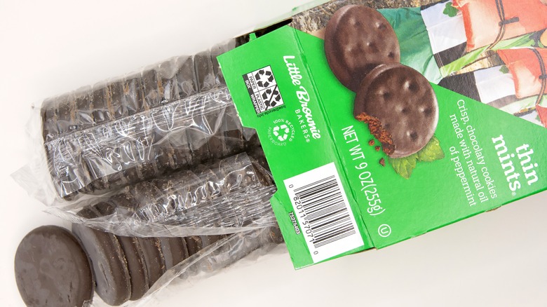 An opened box of Thin Mint Girl Scout Cookies.