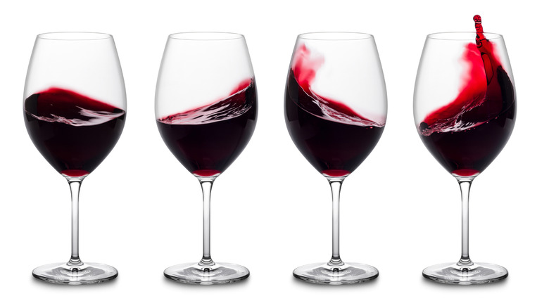 Glasses of red wine that have been swirled.