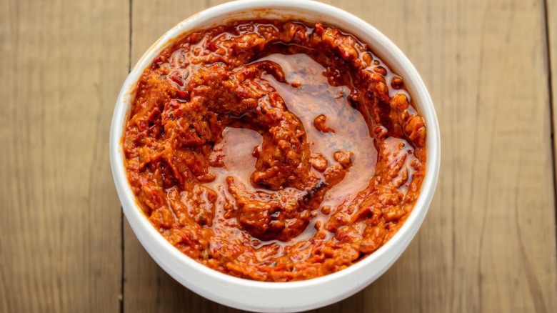 Harissa in a white ramekin