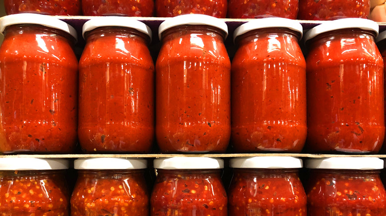 Jars of tomato passata stacked