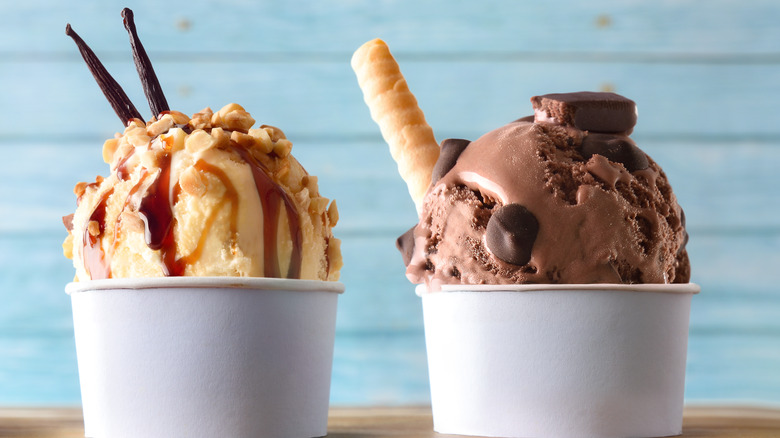 Tubs of chocolate and vanilla ice cream