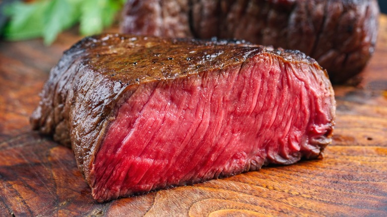 Close-up of a rare steak, with visible muscle fibers