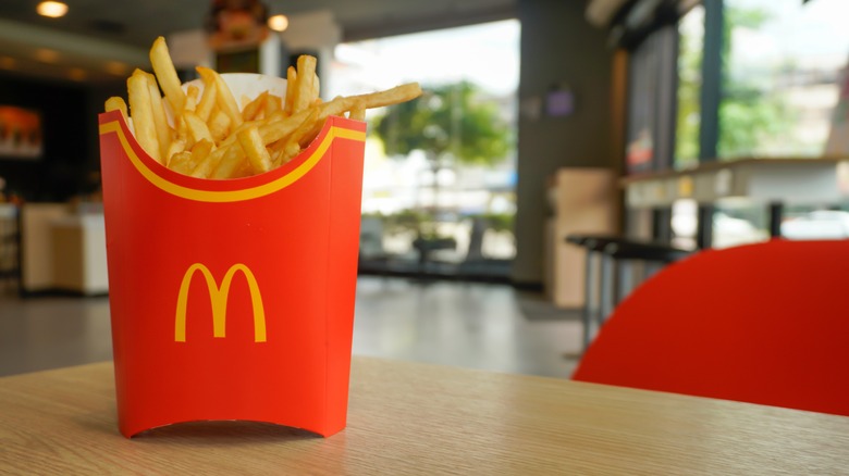 container of mcdonald's fries table