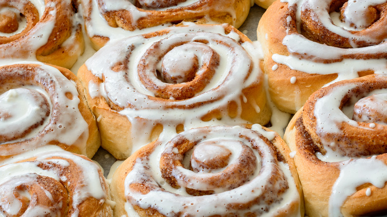 close-up of cinnamon rolls with icing