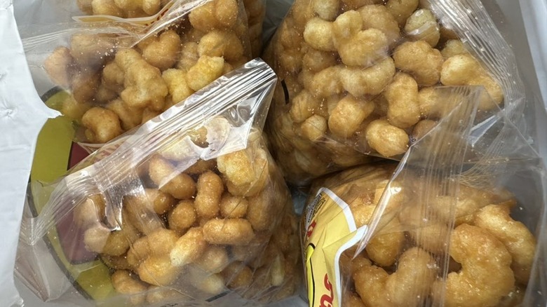 four bags of buc-ee's beaver nuggets