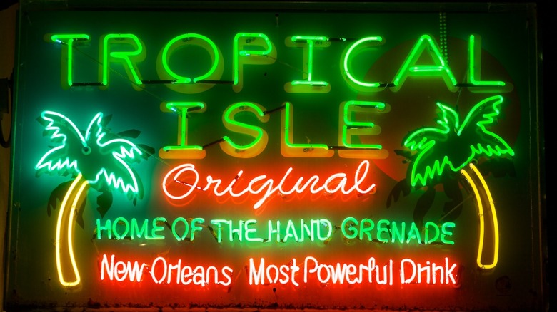 Neon sign that reads: Tropical Isle Original Home of the Hand Grenade New Orleans Most Powerful Drink.