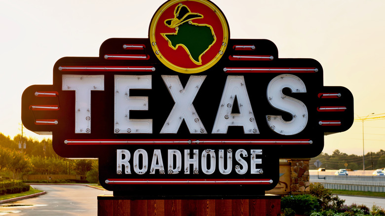 Texas Roadhouse restaurant sign by the highway