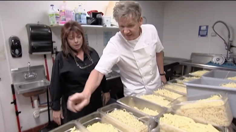 Gordon Ramsay shows Julie Watson some cooking techniques