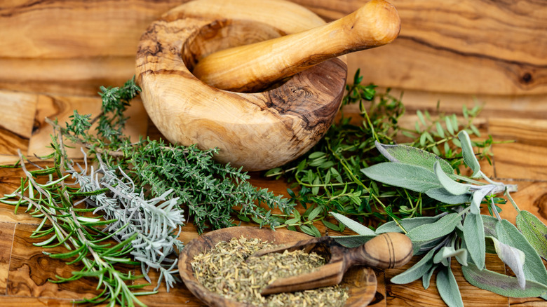 Herbs from Provence on wooden surface