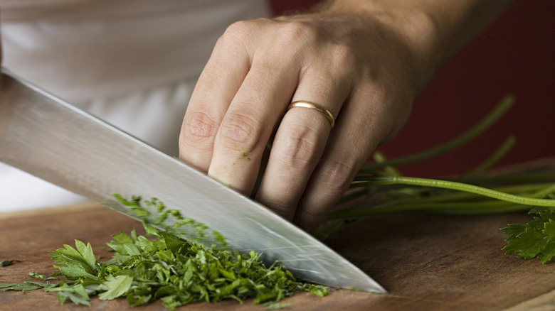 Finely chopping herbs