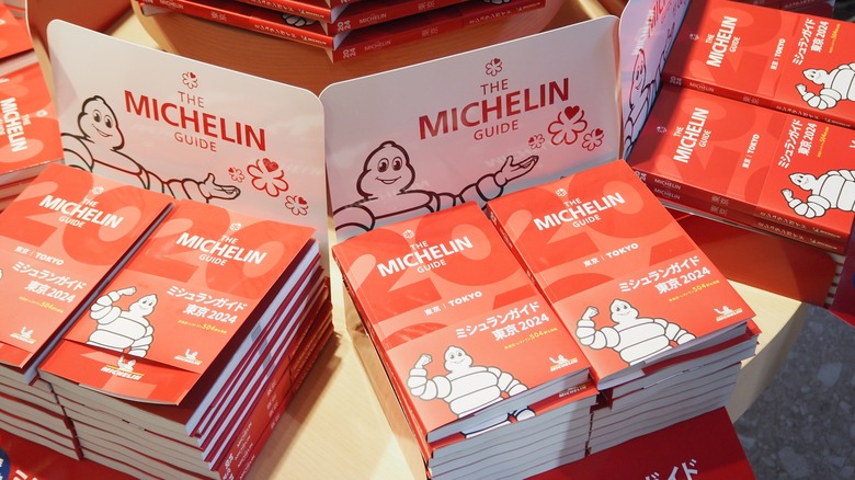 Table full of current Michelin guides.