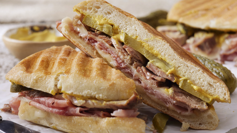 sliced Cuban sandwich on a plate