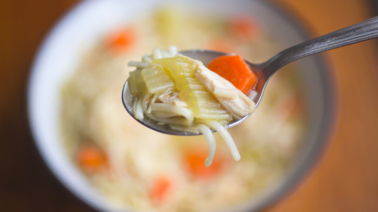 A spoonful of chicken noodle soup