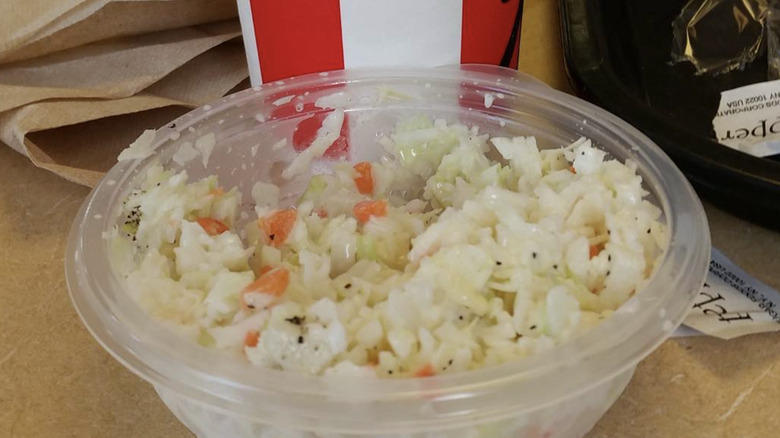 kfc coleslaw in plastic cup by kfc soda cup