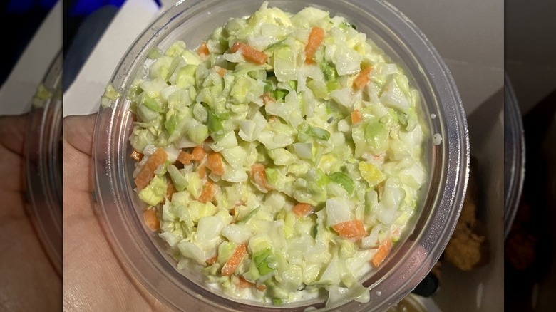 kfc coleslaw in plastic bowl overhead