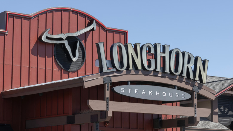 Close up shot of a Longhorn Steakhouse storefront on a sunny day