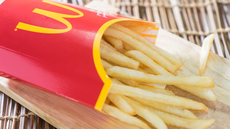 mcdonalds fries pouring out of carton