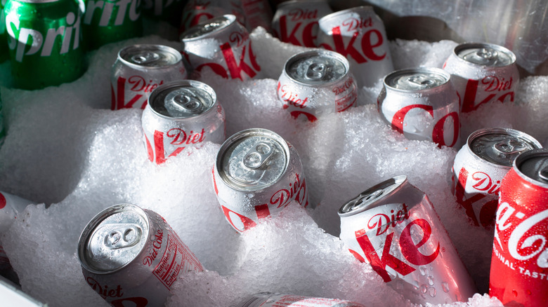 Cans of Diet Coke on ice