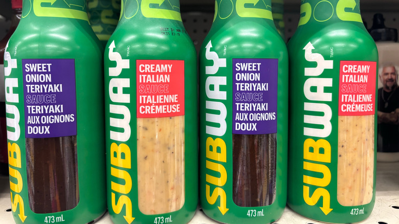 Four bottles of Subway sauces on a shelf