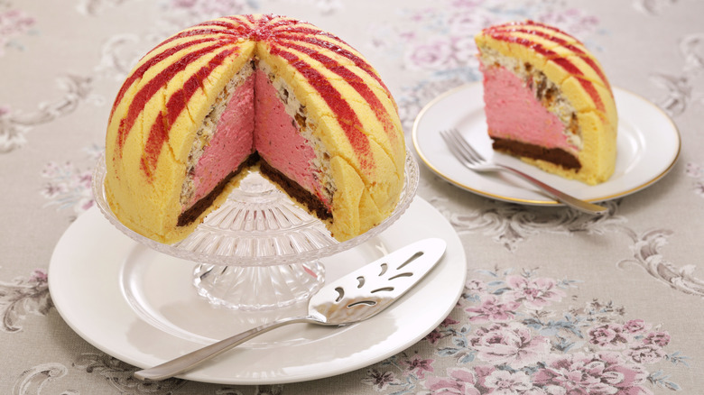 A dome-shaped cake with filling