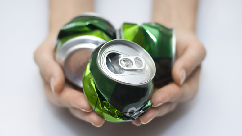 crushed green soda cans