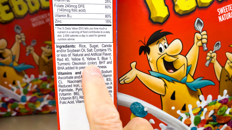 Customer points to synthetic dyes on ingredients list children's cereal