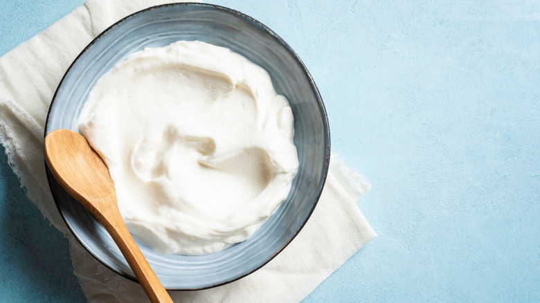 plain yogurt in blue bowl