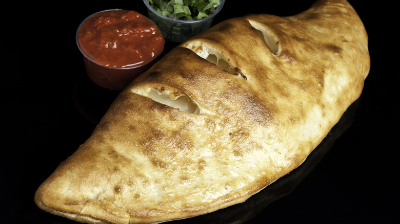 Italian calzone with dipping sauce