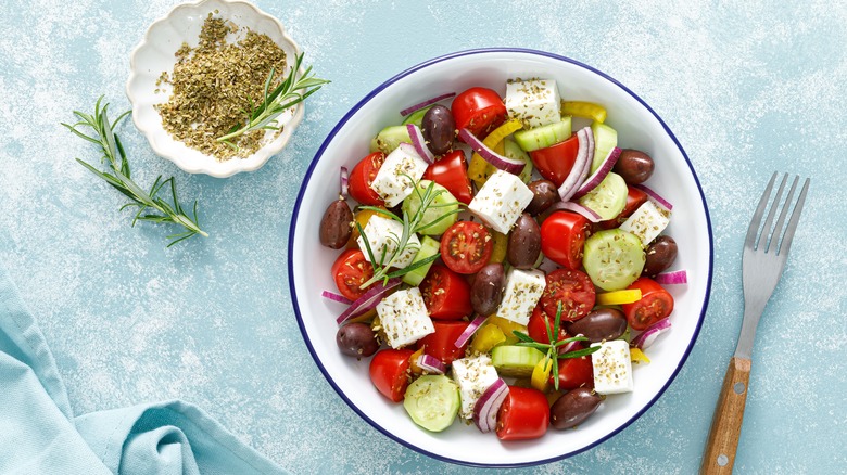 Greek salad with different cheeses and vegetables