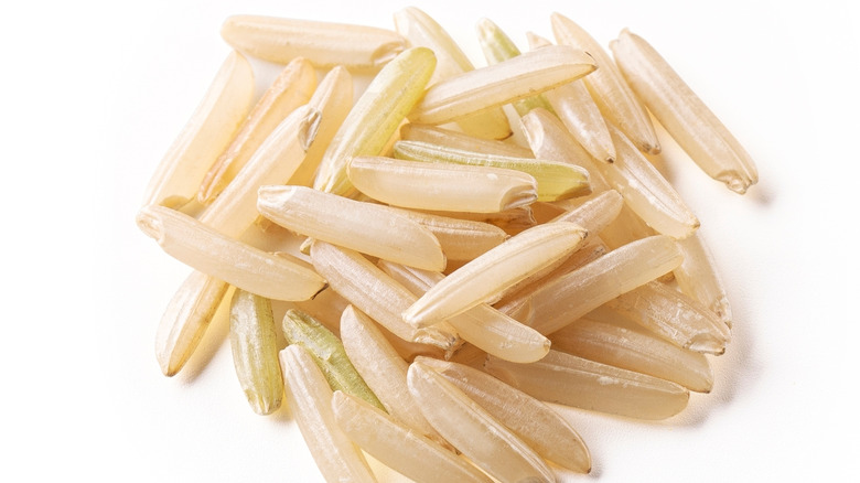 a close up shot of uncooked long grain rice