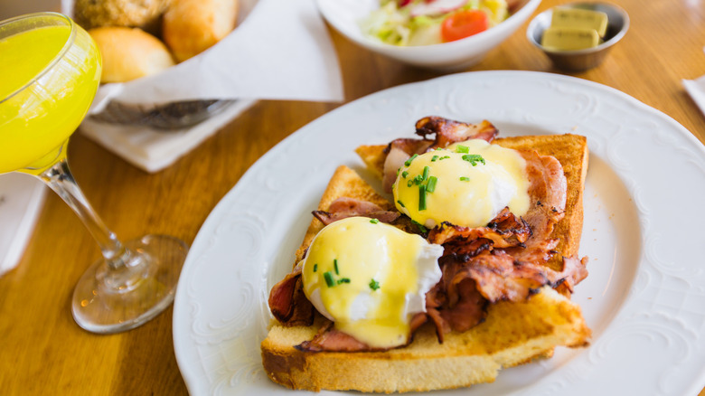 Mimosas and poached eggs for brunch