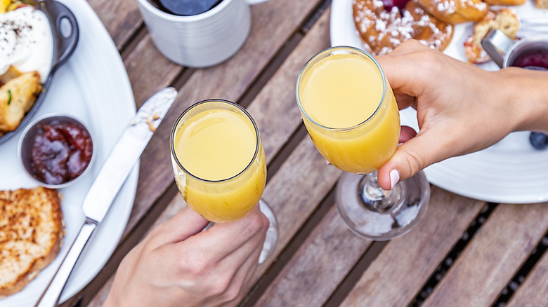 Toasting with mimosas