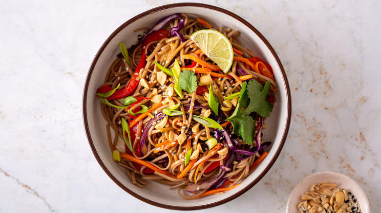 Soba noodle salad with vegetables and peanut sauce