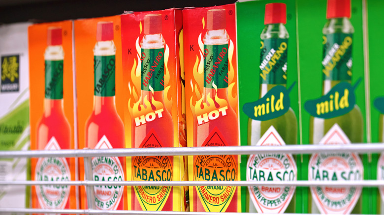 Different varieties of Tabasco Original sauce on a grocery store shelf