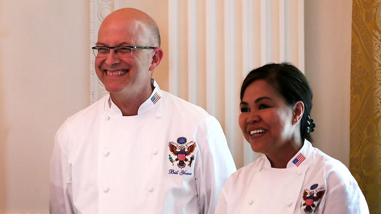 Bill Yostes and Cristeta Comerford smiling at White House