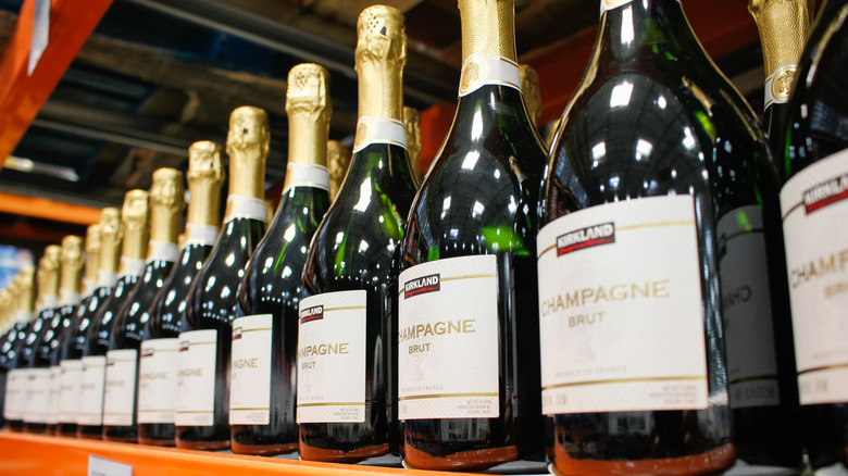 Close up of Kirkland Champagne Brut bottles sitting on a shelf