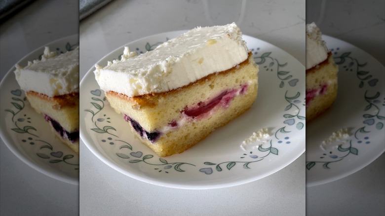 a slice of whole foods berry chantilly cake