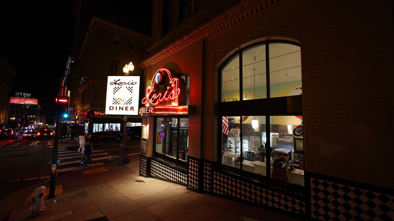 Exterior of an empty diner at night