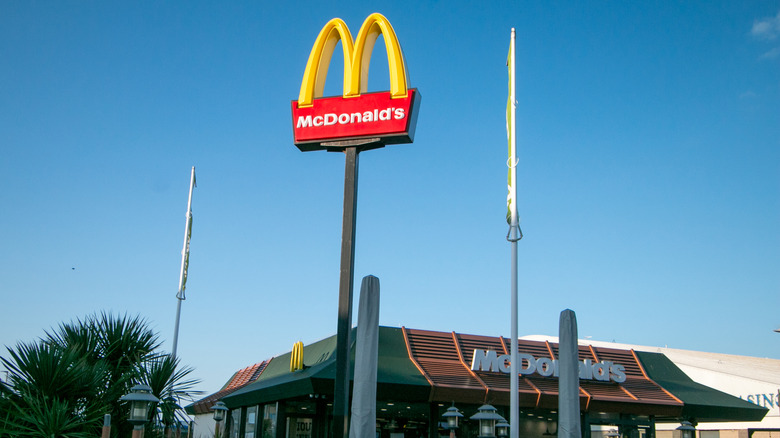 A classic McDonald's highway exit sign and building