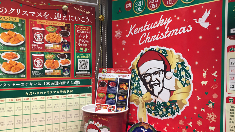 "Kentucky Christmas" promotional KFC merchandise from Japan, including a wall calendar and a special holiday bucket