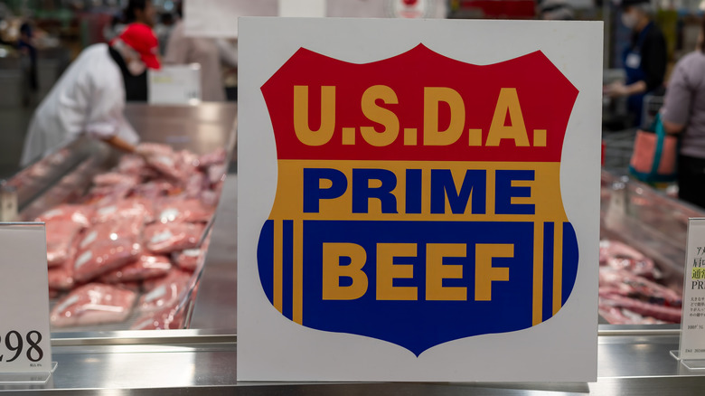 USDA prime beef sign with Costco meat in background