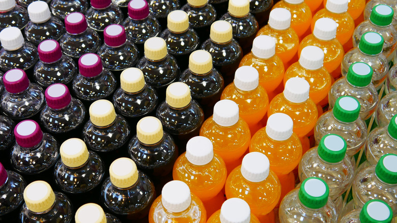 Bottles of unmarked soda are shown from overhead