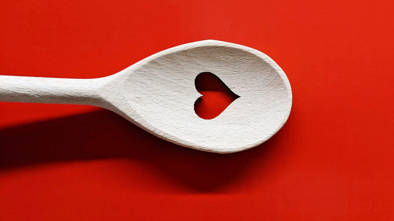 Wooden spoon with a heart-shaped hole in the middle