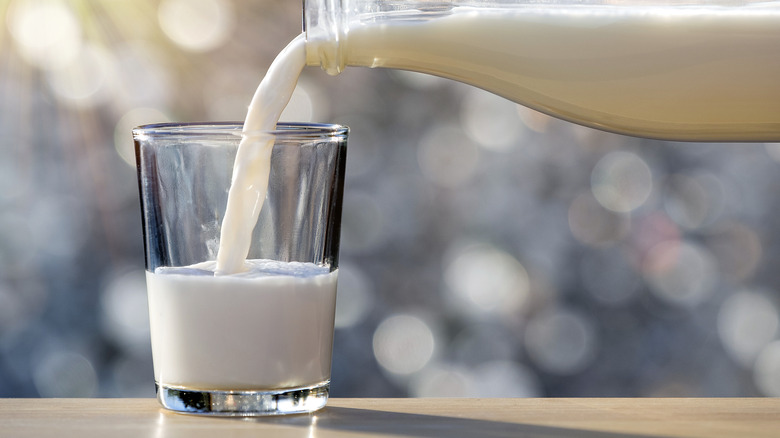 pouring milk into glass