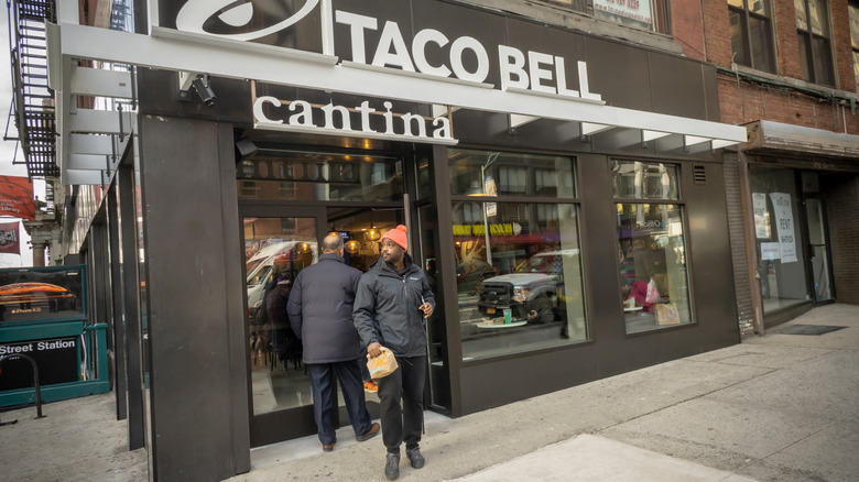 man outside city Taco Bell Cantina