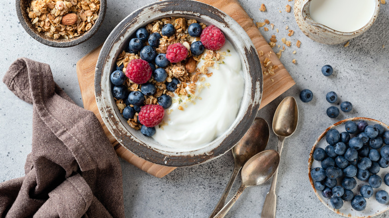 Yogurt with fruit and granola on top