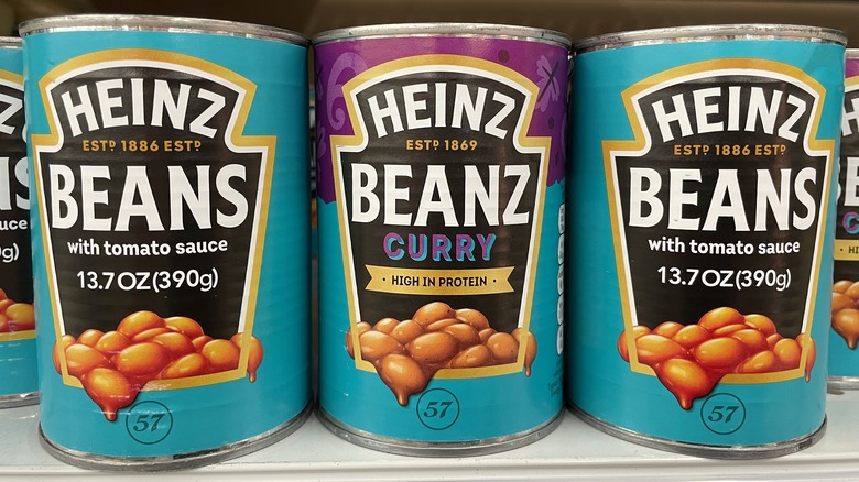 Cans of Heinz baked beans in tomato sauce