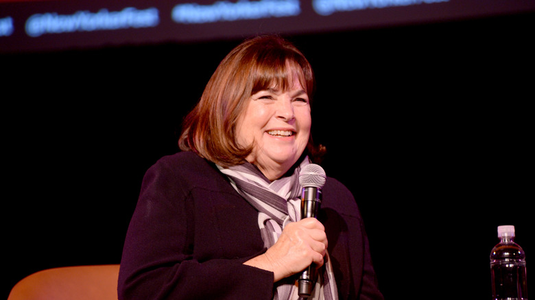 Ina Garten holding a microphone.